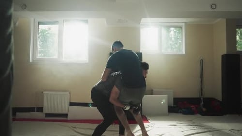 Fighter Throws Partner Punching on Club Floor