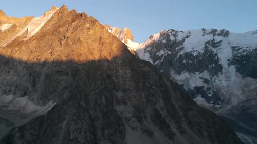 Scenic View of Mountains Against Sky During Sunset