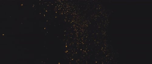 Goldstaubpartikel schweben langsam