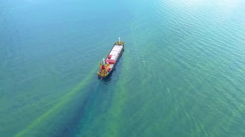 Aerial View of Cargo Ship on Calm Waters
