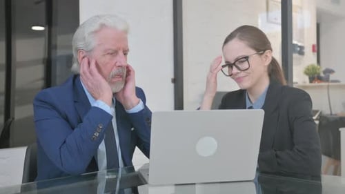 Business People Reacting to Loss