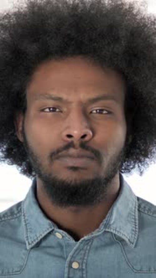Adult Man with Afro and Beard Portrait Close Up