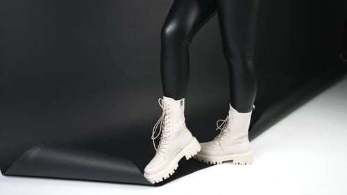 Trendy Boots and Leggings in Studio Fashion Shoot