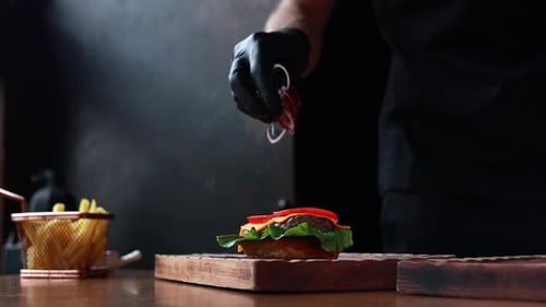 Burger Being Prepared in Restaurant Kitchen