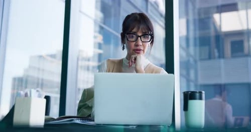 Writing, planning and laptop with business woman in office for patent lawyer