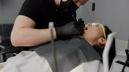 Dentistry examination of the patient's teeth dentist dental clinic patient with toothache and caries