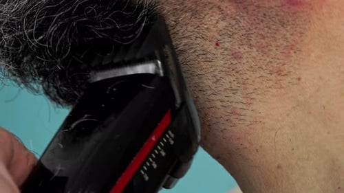 Haircut Along Hairline With Electric Trimmer Close Up