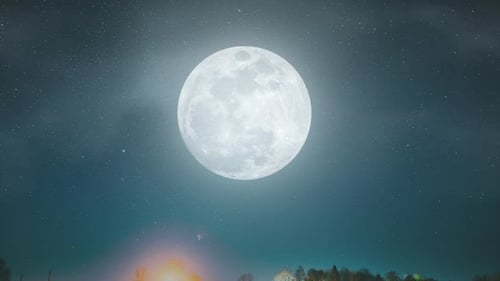 Full Moon Shining in a Dark Night Sky with Twinkling Stars
