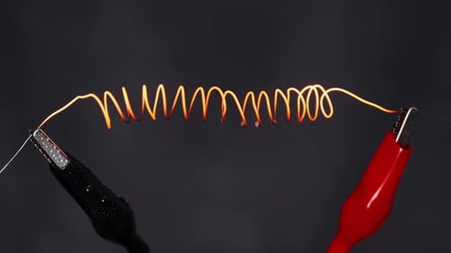 Nichrome Filament Glowing to Red Under High Electric Current