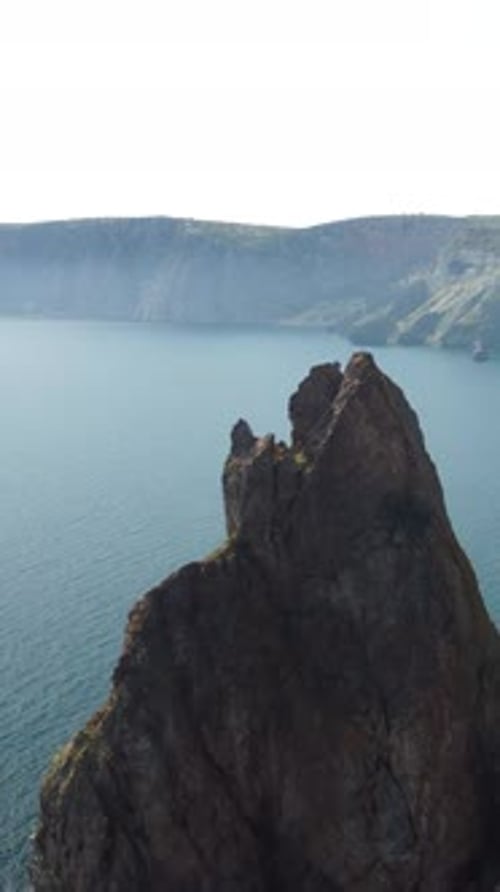 Aerial Vertical View of Seascape with Crystal Clear Azure Sea and Rocky Shores A Beautiful Lagoon on