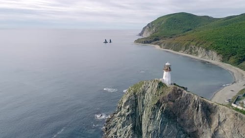 Aerial View of an Old Lighthouse on the Cliff on Pacific Coast Beautiful Panoramic Seascape