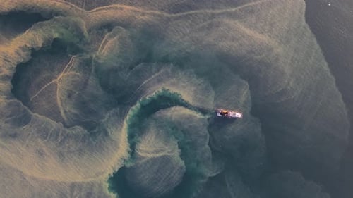 Fishing Ship In Turbid Sea