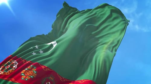 Turkmenistan Flag Waving Against Blue Sky