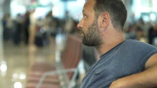 Impatient Man Waiting for Plane at the Airport 30s