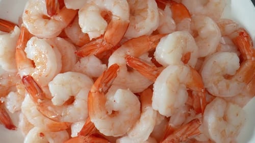 Cooked shrimp in stunning footage. 4K.