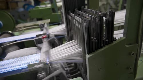 Textile Loom Weaving White Threads in Factory