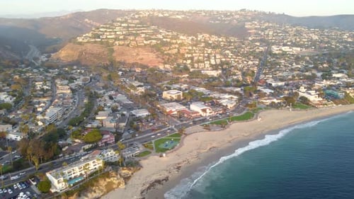 Downtown Laguna Beach, at Sunset. Orange County, Southern California Coast, USA. Drone View of Ocean