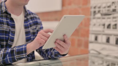 Close up of Man Hand Using Tablet PC