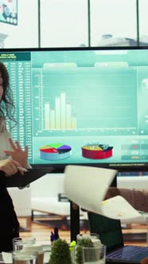 Vertical Video Coworkers Engaging in a Problem Solving Meeting at a Corporation