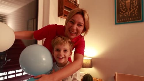 Blond Boy Celebrating his Birthday with Family