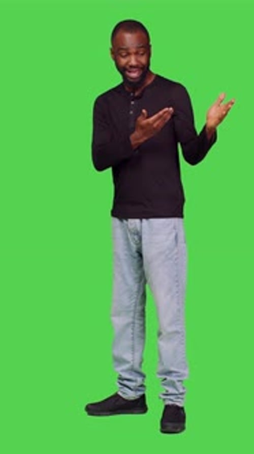 Vertical Video Side View of African American Man Creating Advertisement in Studio