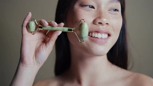 Asian woman beauty session in studio.