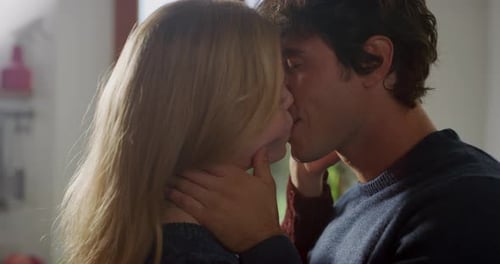 Portrait Close Up of a Young Couple Kissing, Being Affectionate Towards Each O