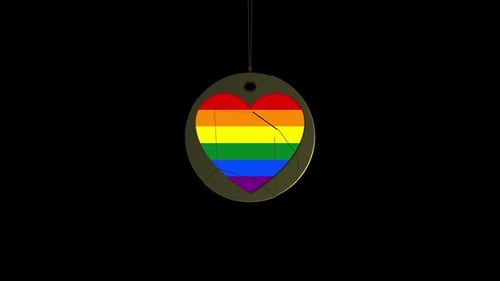 Golden Pendant Reveals Rainbow Pride Heart