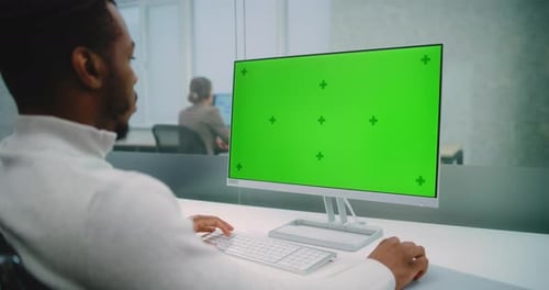 African American Marketing Manager Works on Computer with Green Screen Chroma Key
