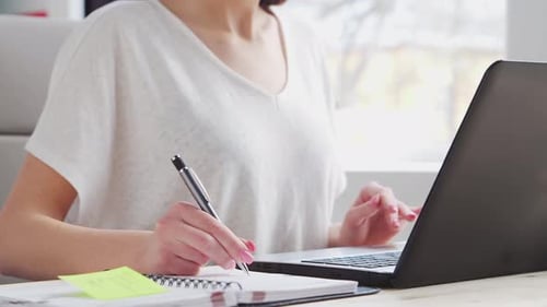 Young Woman Works at Home Office Using Computer Workplace of Female Entrepreneur Freelancer or