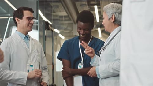 Diverse Medical Team Talking at Hospital