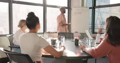 Business leader, presentation and whiteboard for office meeting with team of employees for planning