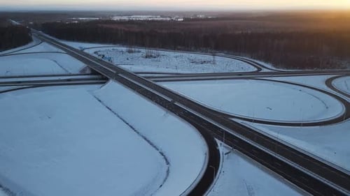 Aerial View Capturing the Stunningly Beautiful SnowCovered Roads and Intersections During a