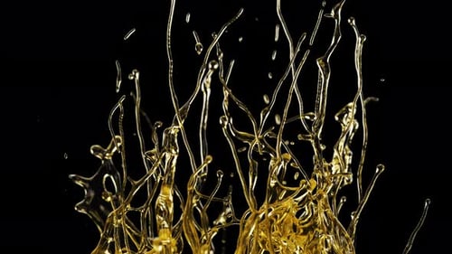 Nahaufnahme von Öl, das isoliert auf schwarzem Hintergrund spritzt und fließt. Zeitlupenaufnahme von Splash Golde...