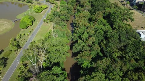 Aerial view of a river in a beautiful park in a metropolitan city in Brazil