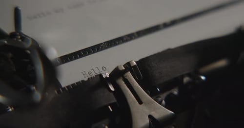 Antique Typewriter Typing Message in Extreme Close Up