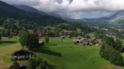 Aerial View of Grindelwald Village and Cable Cars in Swiss Alps