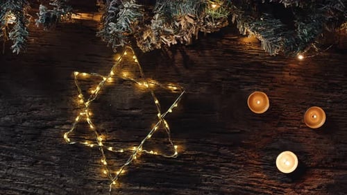 Happy Hanukkah Star David on Wooden Background