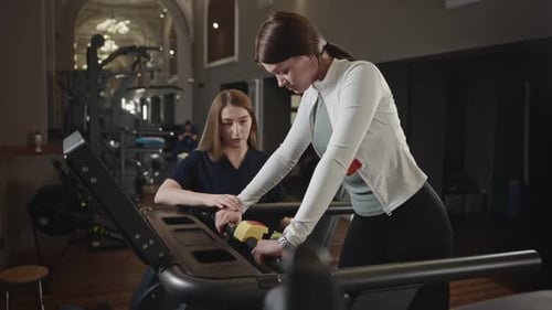 The Patient is Recovering From an Injury Using a Treadmill in the Clinic's Specialized Gym A Medical