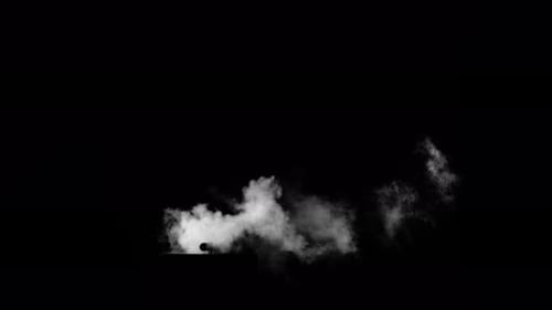Fume Collection: A gas escapes from a small pipe on a black background, shot in 4k