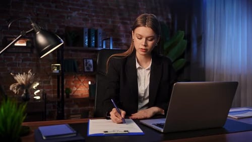 Focused Professional Writing Notes in Modern Office