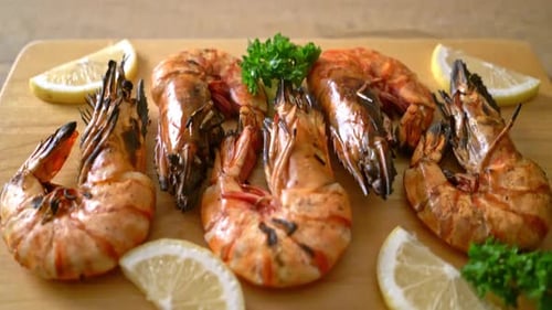 Grilled Shrimp with Lemon on Cutting Board