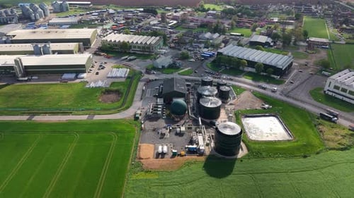 Aerial view of grain storage silos and water treatment plant, United Kingdom.