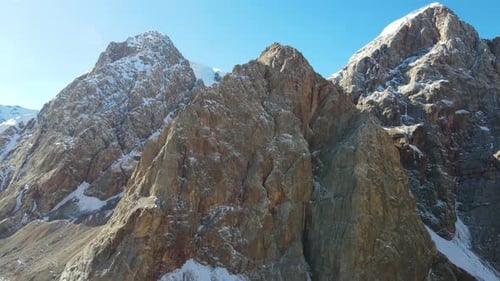 Rugged mountain peaks covered with snow