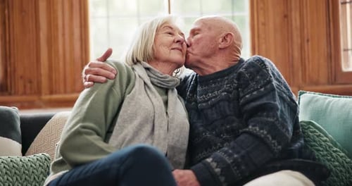 Senior Couple Embracing With Love at Home