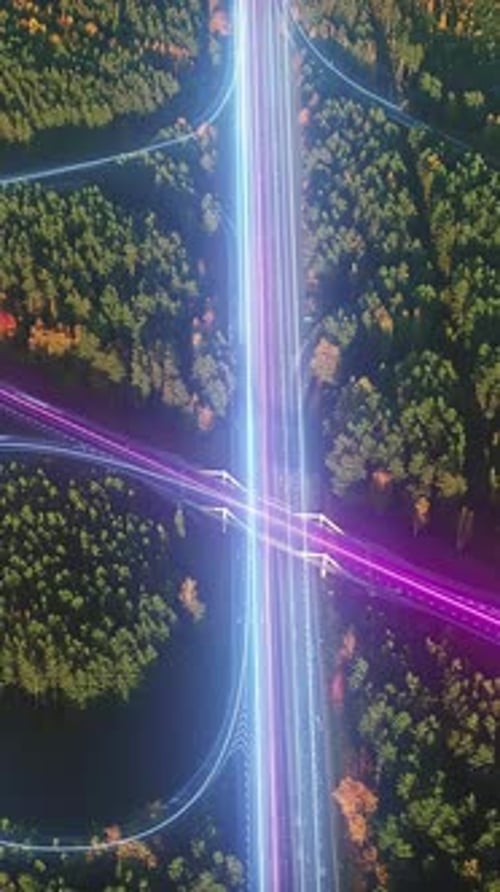 Circulation à un échangeur autoroutier - vue directe vers le bas avec des lignes d'animation lumineuses