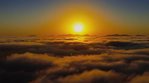 Golden Sunrise Over Dreamy Cloudscape