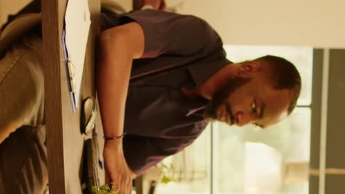 Man Smiling in the Office Environment at Work