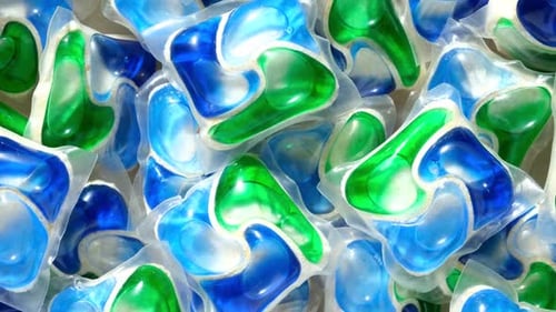Close up of Blue and Green Laundry Detergent Pods