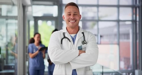 Confident Doctor Smiling in Modern Hospital Environment
